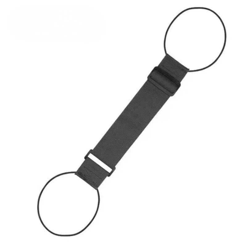 A black heavy-duty nylon luggage strap with two circular loops.