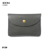 A dark grey genuine leather card holder or coin purse with a gold-toned clasp.