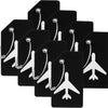 A set of black silicone luggage tags with silver chains and airplane shapes.