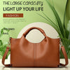 A brown leather tote bag is displayed against a green background with text promoting fashion and light.