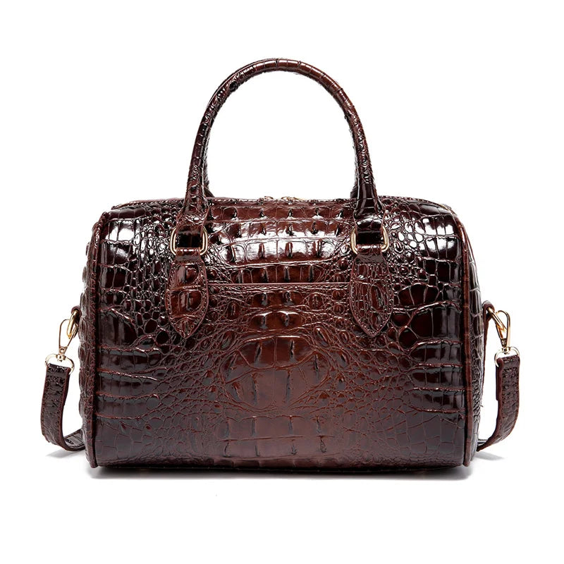 A dark brown crocodile pattern luxury leather crossbody tote bag with a handle.