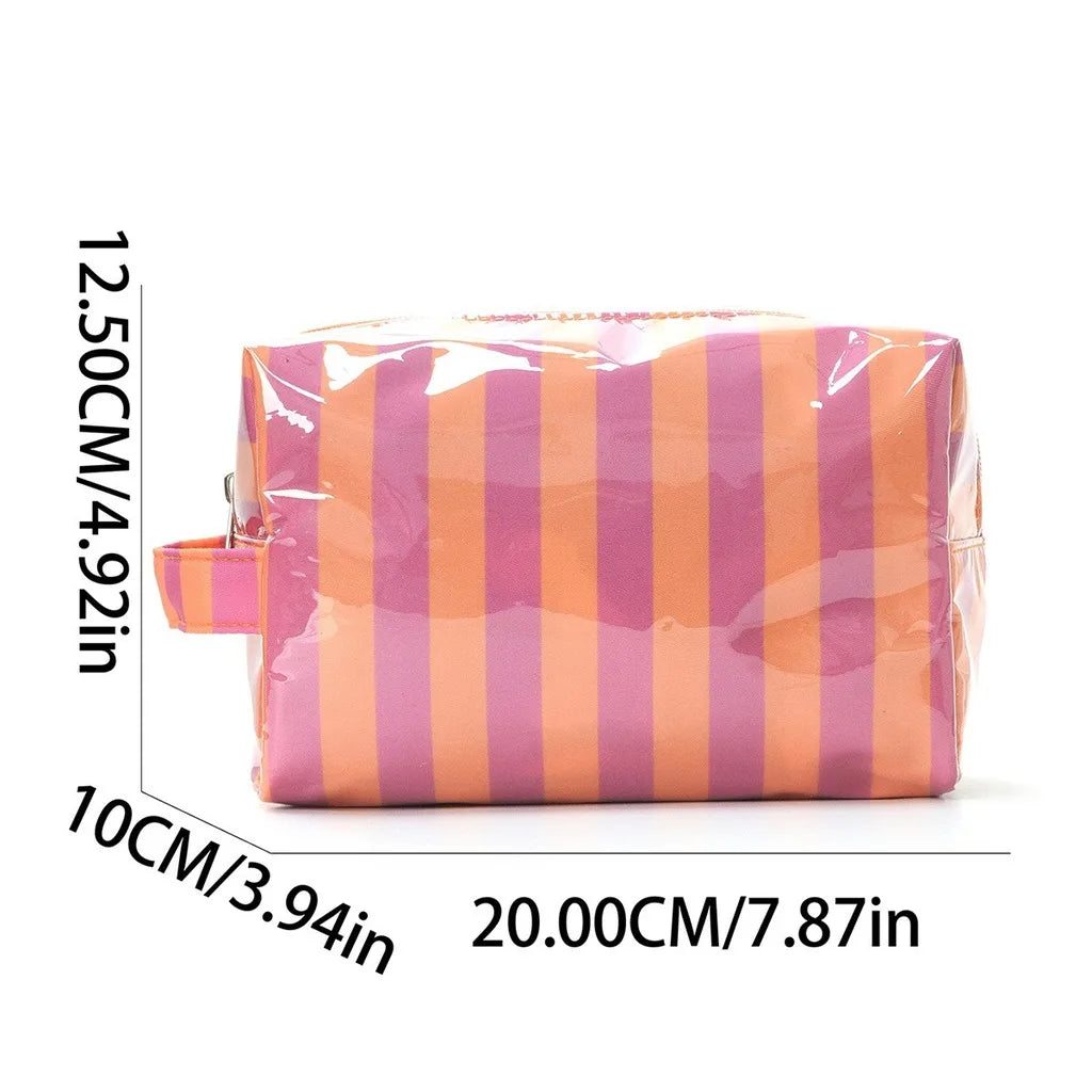 A striped waterproof cosmetic bag in pink and orange stripes shown flat.