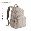 A beige quilted casual backpack for students with a padded strap and zippered pockets.