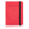 A red leather passport wallet with a black strap, featuring the words 'PASSPORT' and 'travel wallet'.