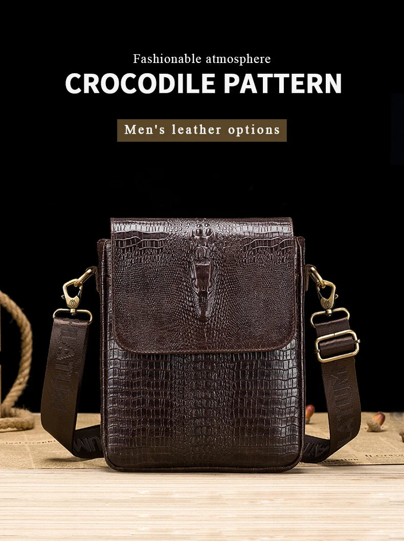 Dunkelbraunes Lederhandtasche mit Krokodilmuster, auf einer Holzoberfläche.