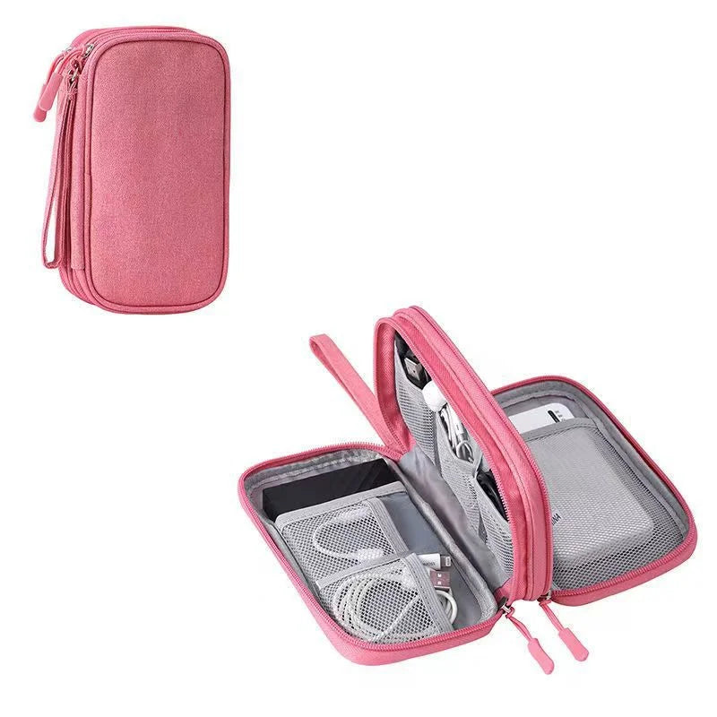 A pink waterproof cable organizer storage bag shown closed and open displaying internal mesh compartments