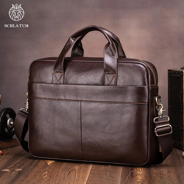 A dark brown genuine leather men's briefcase with leather handles and a flap closure resting on a wooden surface.