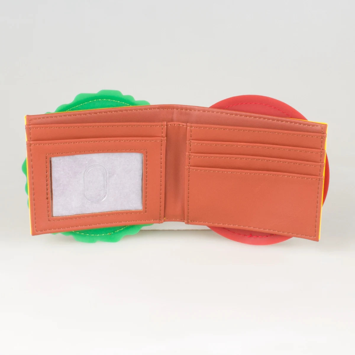 An orange foldable card holder wallet with green and red accents.