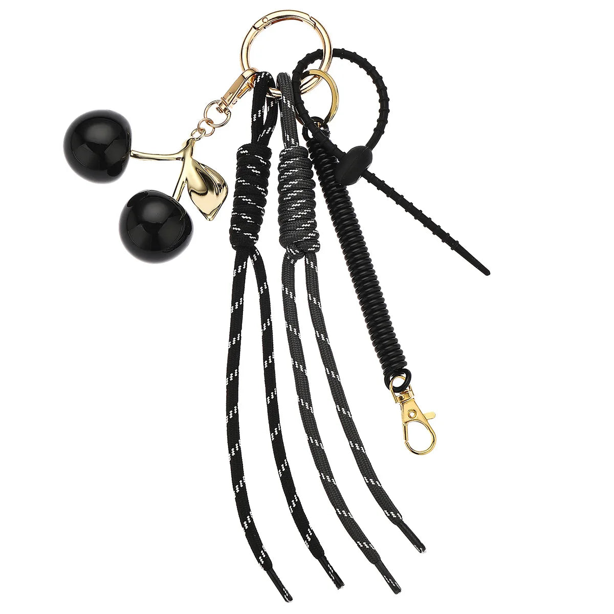 A pink cherry charm bag keychain featuring a gold-colored charm and a black braided rope.