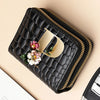 Black PU leather double-zip clutch wallet with a gold zipper and a light yellow cartoon print detail.