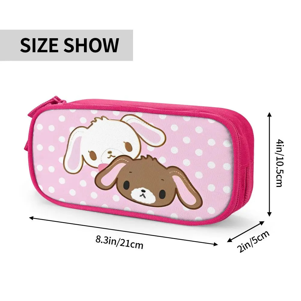 Pink fabric pencil case featuring a white and brown puppy design with a zipper closure.