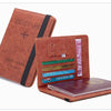 A brown leather passport holder with a black strap and an attached passport wallet.