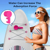 A woman holds a pink multi-functional kayak drink holder and phone stand against a white surfboard.