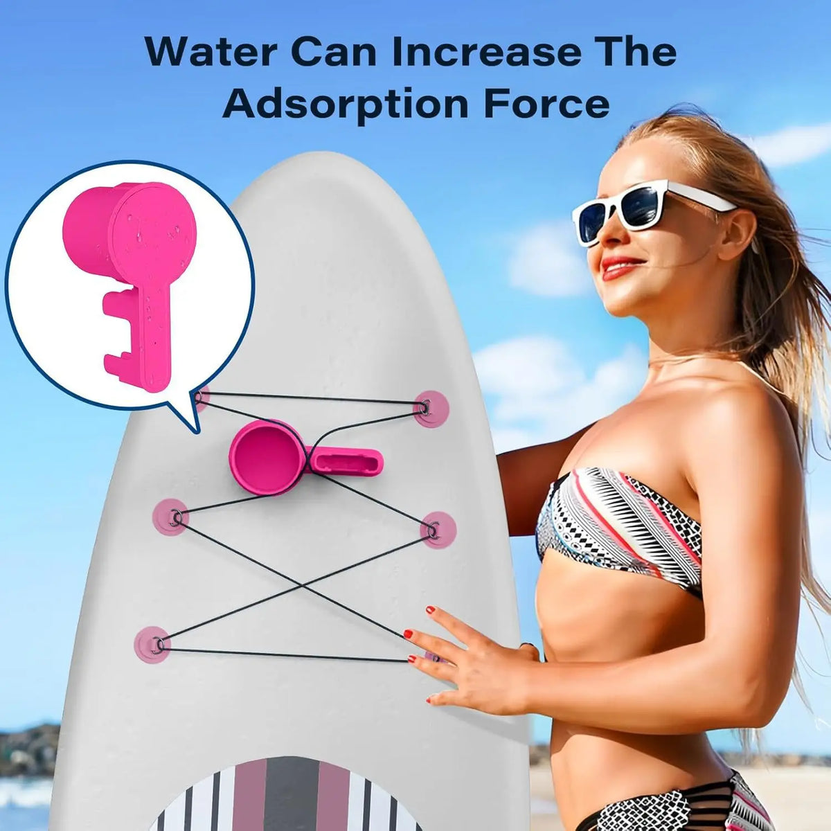 A woman holds a pink multi-functional kayak drink holder and phone stand against a white surfboard.