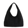 A black retro suede shoulder tote bag shown against a white background.