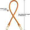 A tan genuine leather replacement shoulder strap with adjustable metal clasps shown in an X shape.