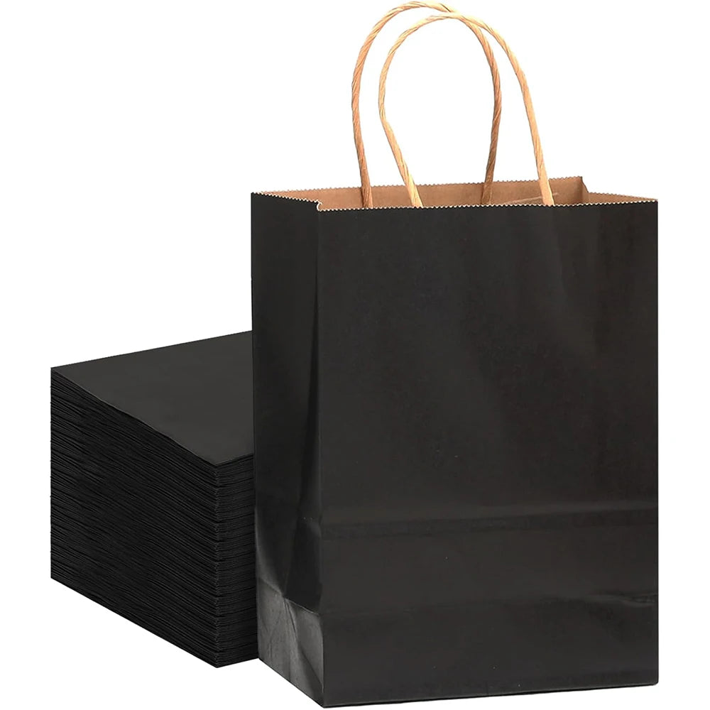 A stack of black reusable kraft paper gift bags with natural twine handles.