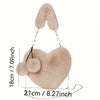A light beige faux fur heart-shaped crossbody purse with a gold chain strap.