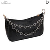 Black faux leather shoulder bag with a silver chain strap and gold hardware