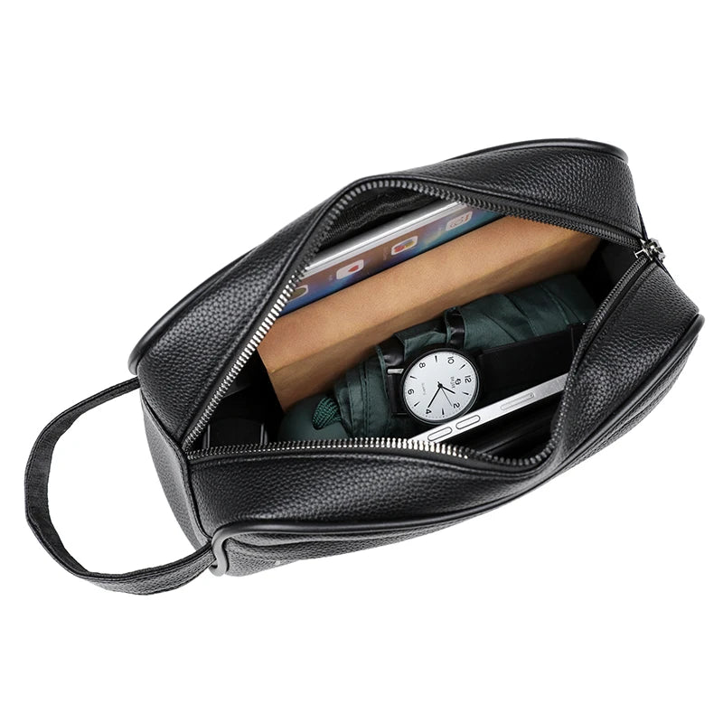 Black vintage PU leather clutch bag with a zipper opening showing a watch and a rolled-up item.