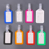 A set of six customizable luggage tags in various colors including blue, gray, pink, white, orange, and green.