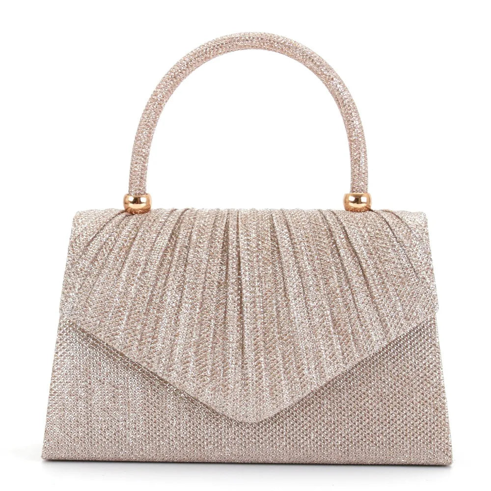 A light pink sequined lightweight crossbody evening bag with a gold-toned handle.