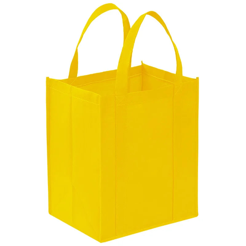 A bright yellow reusable eco-friendly tote bag with handles.