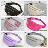 A collection of multi-layer sports waist bags in black, beige, pink, and purple, shown from various angles.
