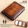 A brown leather wallet with the OLPHIA brand embossed on it, shown next to a hand demonstrating its RFID blocking protection.