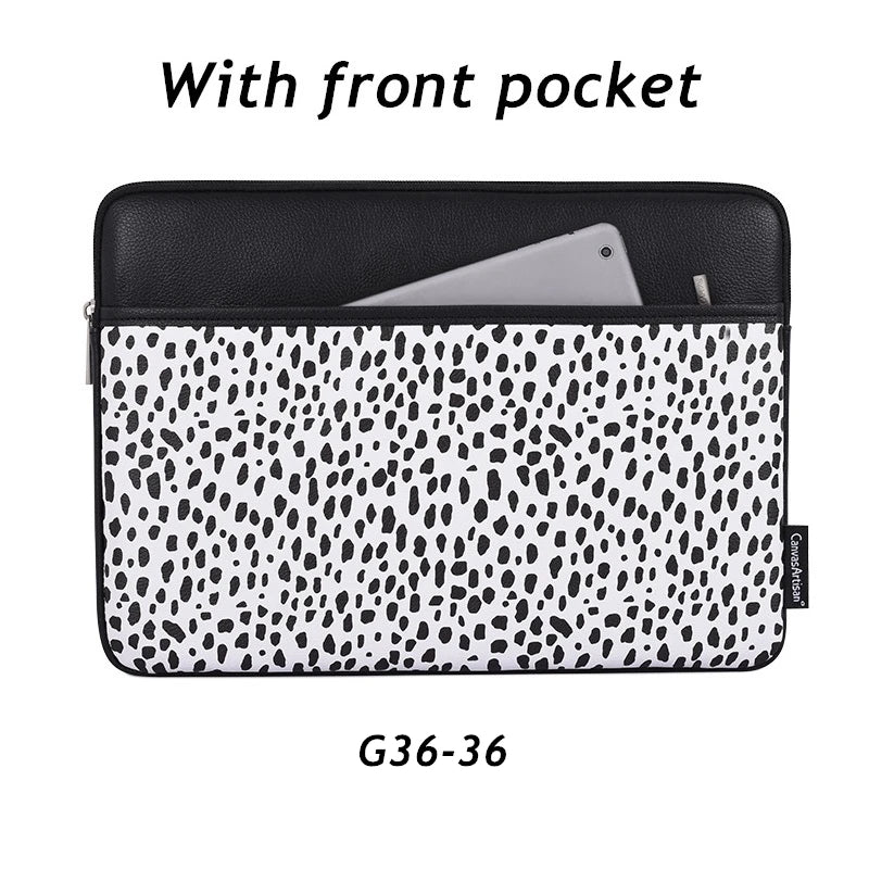Black and white spotted laptop sleeve with a front pocket