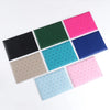 A set of six heart print passport covers in various colors including green, pink, blue, black, and beige.