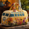 A quilted travel duffle bag decorated with colorful flowers and peace signs, featuring striped handles.