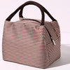 Brown and white striped insulated lunch tote bag with a black adjustable shoulder strap