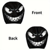 Un jeu de housses décoratives pour siège de voiture noires montrant la face d'un monstre menaçant et crachant
