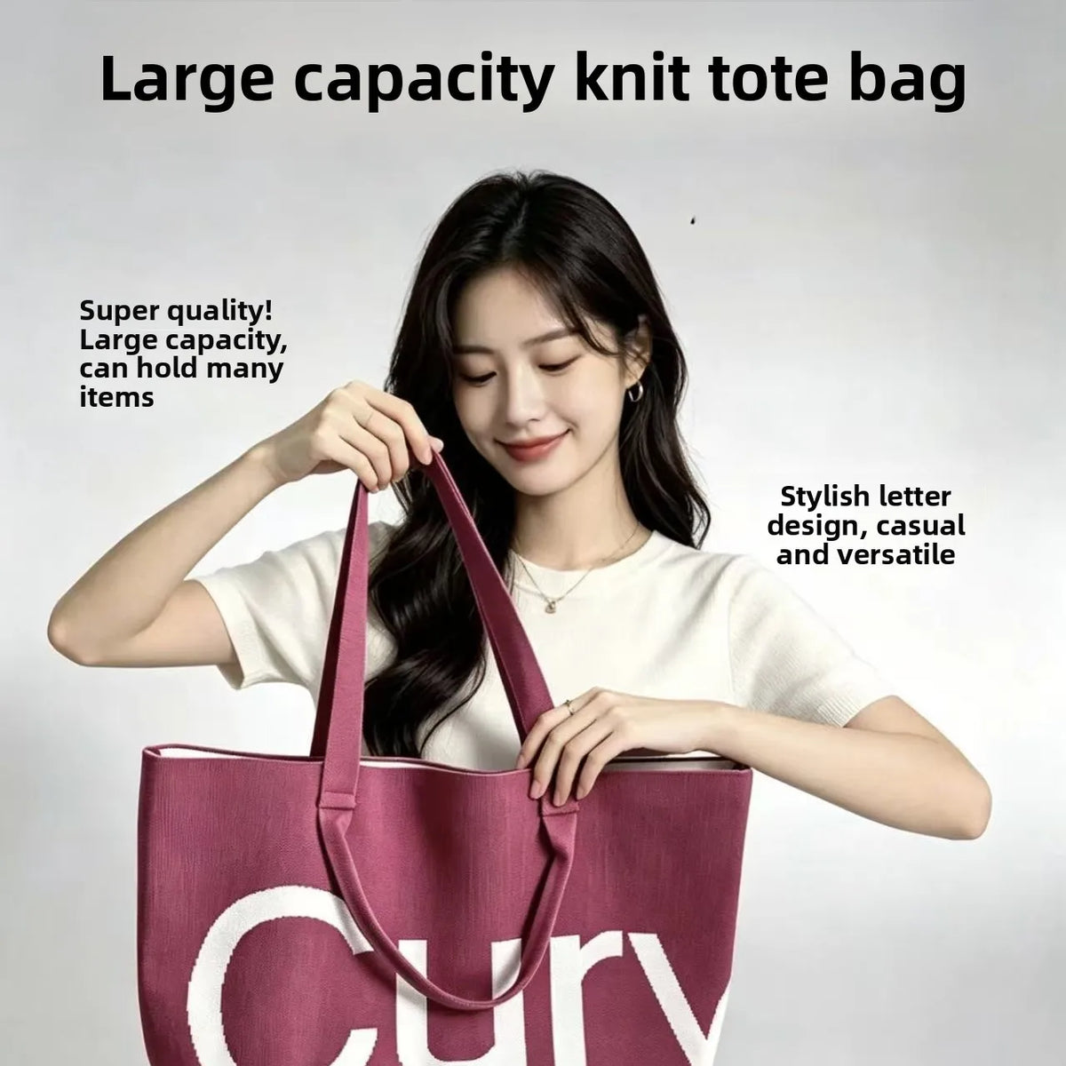 A woman holds a large capacity knit tote bag in a dusty rose color against a light gray background.
