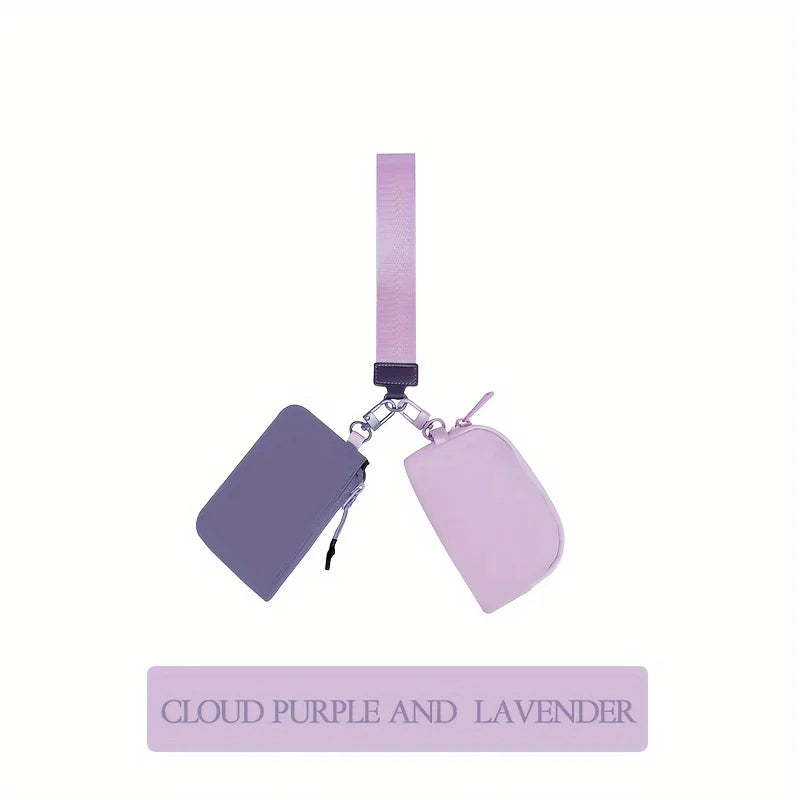 Elegant purple wristlet key card wallet with a pink strap and silver chain.
