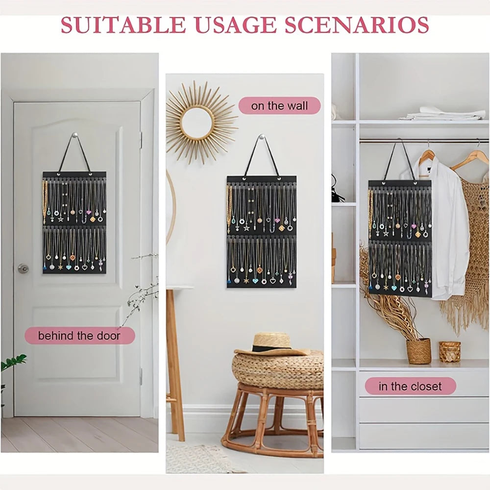 A black wall-mounted jewelry organizer with multiple strands of necklaces displayed on a white wall, door, and in a closet sh
