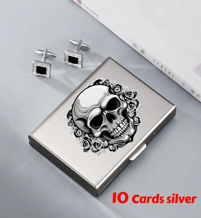 Silver card holder featuring a detailed skull design and ten cards.