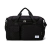 Black portable quilted travel duffle bag with carrying handles