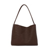 A dark brown woven leather bucket shoulder bag with a long strap.