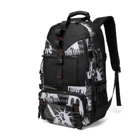 A black durable travel backpack with a camouflage pattern and a padded shoulder strap.