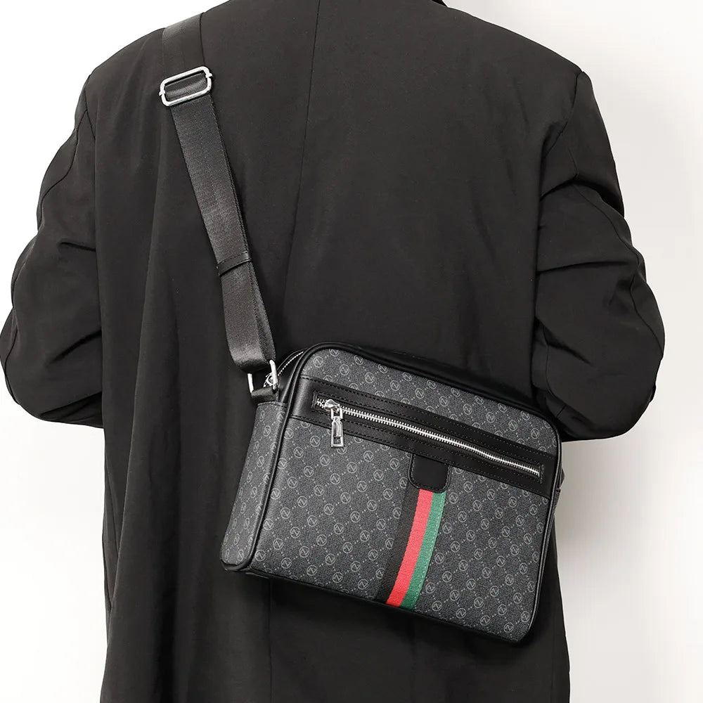Black men's letter print crossbody sling bag worn on a black suit jacket.