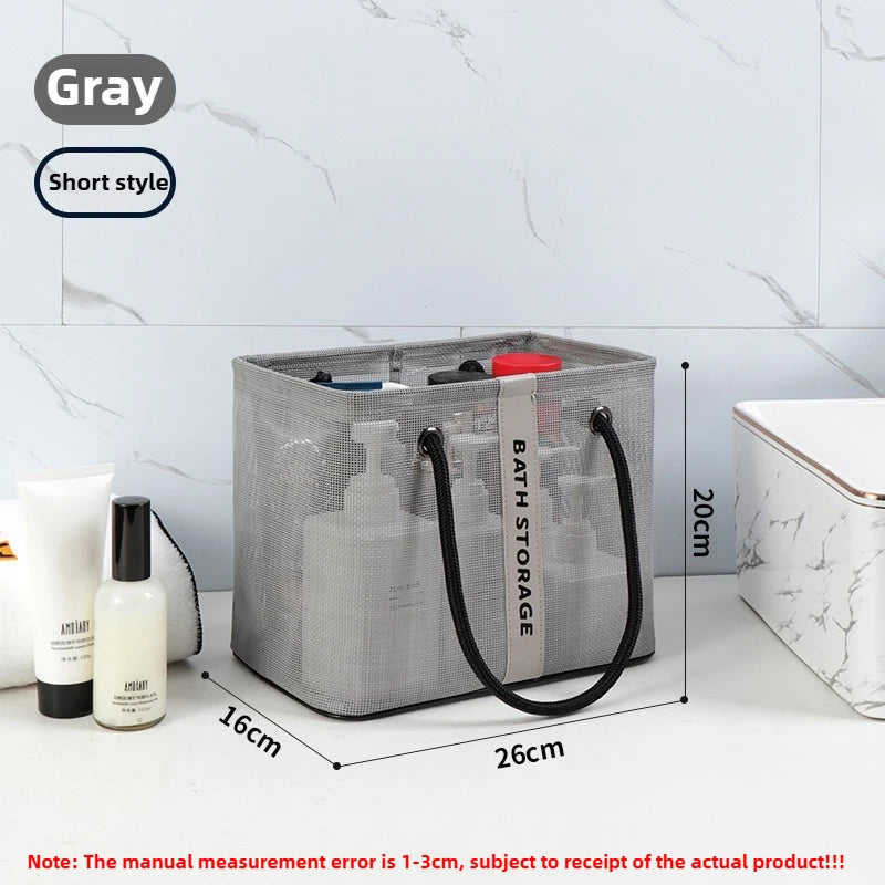 Gray mesh drainage shower tote with a handle shown on a white surface.
