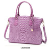 Lavendel-Krokodilmuster-Top mit Henkel und Crossbody-Tasche.