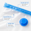 Close-up of a clear vacuum storage bag with a blue double zip seal and an airtight valve on the top.