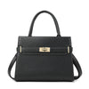 A black leather handbag with a top handle and gold-toned hardware.