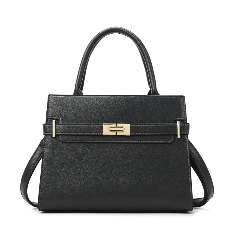 A black leather handbag with a top handle and gold-toned hardware.
