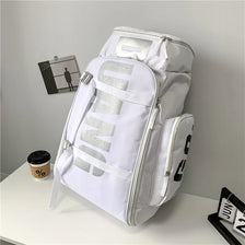 A white waterproof travel gym backpack with gray accents and skateboard straps resting on a white surface.