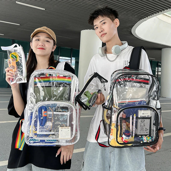 A young man and woman are holding transparent shoulder backpacks in an airport or modern indoor setting.