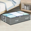 A gray dustproof under bed storage box with reinforced handles is shown next to a wooden dresser.